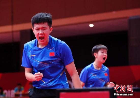 資料圖：雅加達(dá)亞運會，王楚欽/孫穎莎奪得混雙冠軍。 <a target='_blank' href='/'>中新社</a>記者 劉關(guān)關(guān) 攝