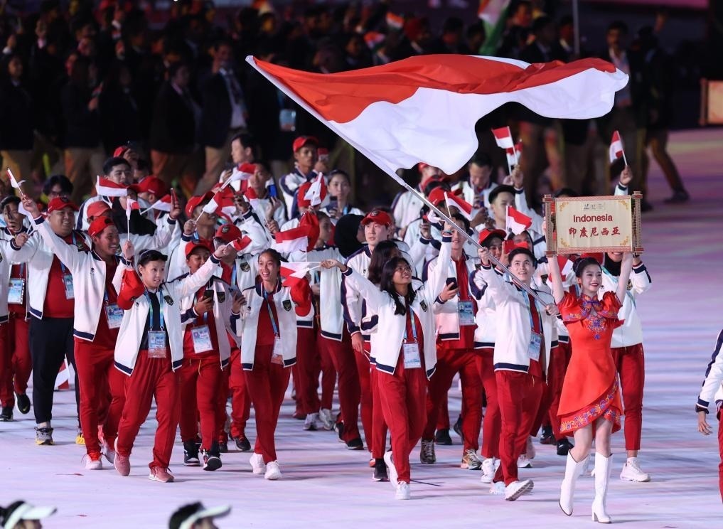 7月28日，印度尼西亞大學(xué)生體育代表團(tuán)在開(kāi)幕式上入場(chǎng)。新華社記者張麗蕓攝
