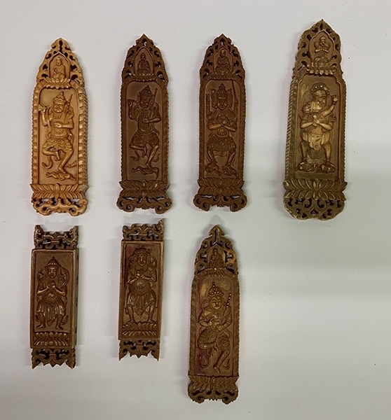 木雕牌飾（暫定名）。國家文物局供圖